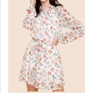 Francesca’s floral frill neck dress